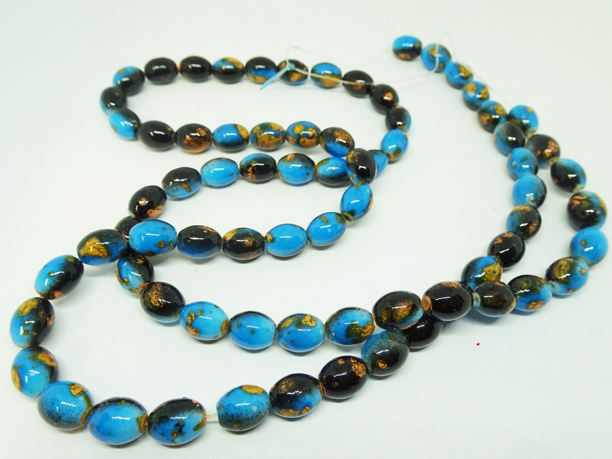 (image for) Turquoise black glass barrel beads 9x12mm #1897