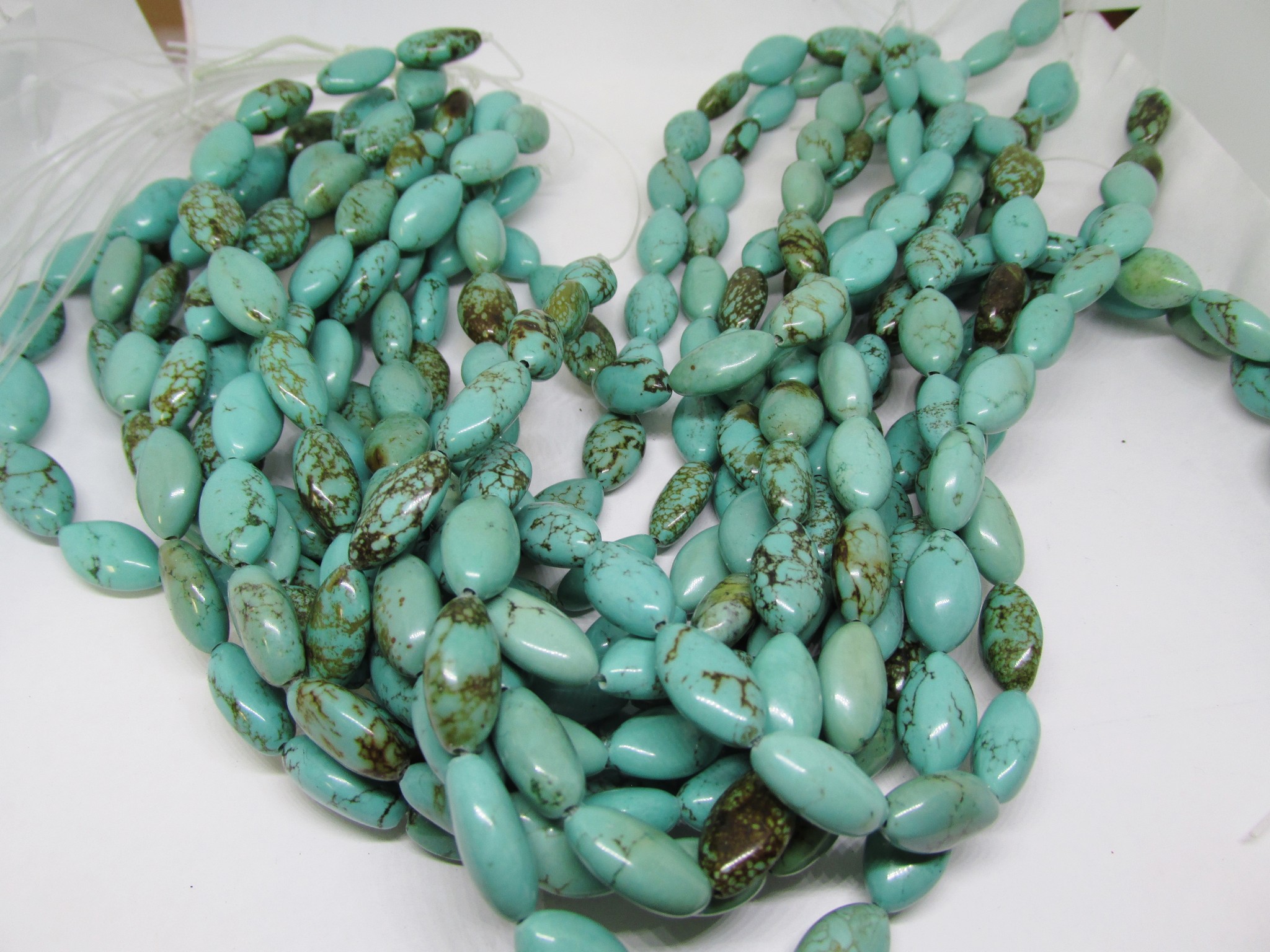 (image for) Turquoise shaped magnesite 10x17mm #1918