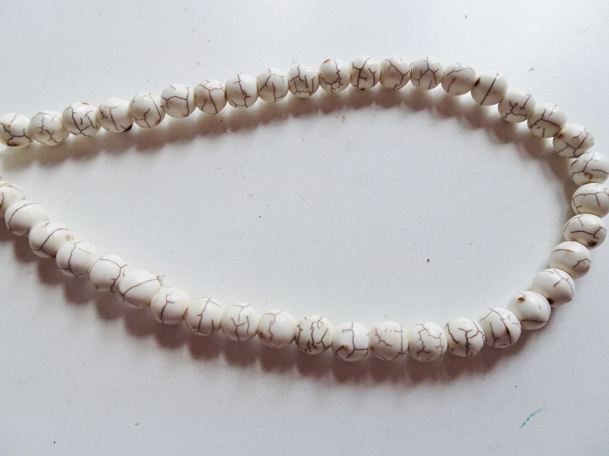 (image for) white magnesite round 10mm beads #Q1264