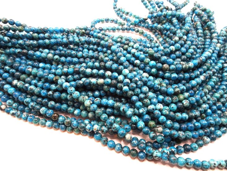 (image for) Blue variated howlite round beads 6mm #2003