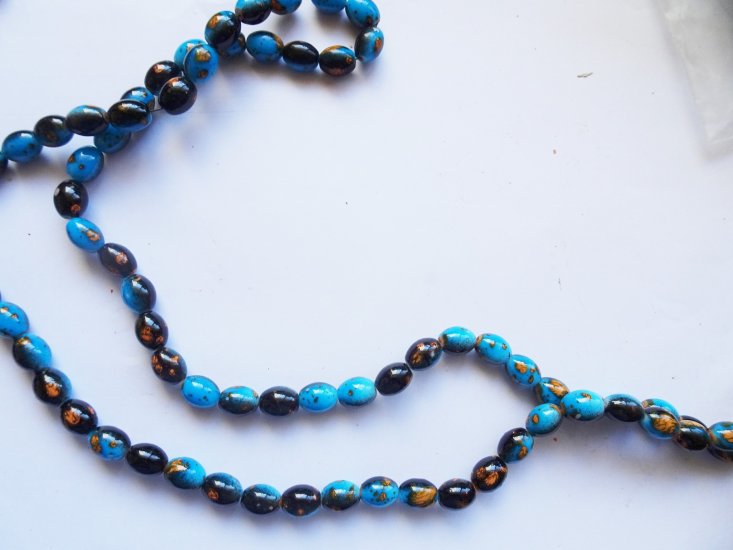 (image for) Turquoise blue glass barrel beads 8x11mm #1426