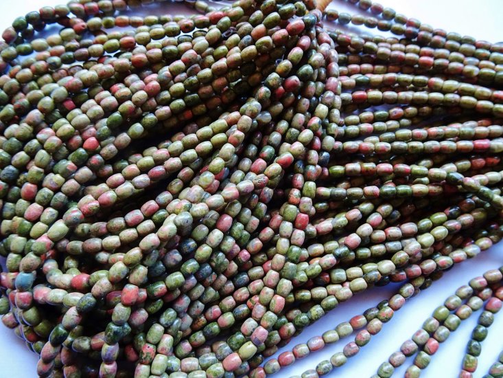 (image for) Green Unikite barrel beads 5x6mm #1137-B