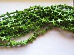 (image for) Green Cross Rosette Beads # 1687